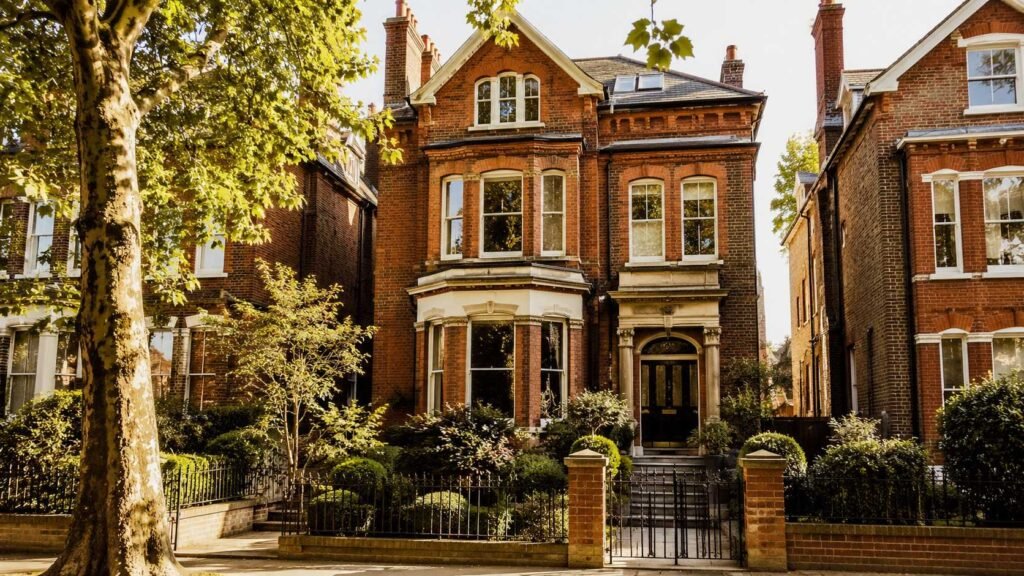 Inside the Dua Lipa House: Where Does Dua Lipa Live? Detached red brick Victorian home on a leafy North London street, representing the style of the Dua Lipa house in West Hampstead