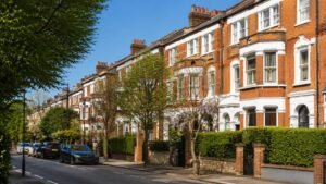 Upscale Victorian homes on a West Hampstead street illustrating the north London property market